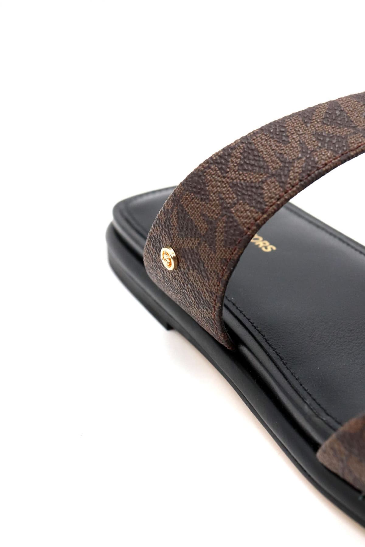 MICHAEL KORS ΠΑΠΟΥΤΣΙΑ ΠΑΝΤΟΦΛΕΣ JAIDA FLAT SANDAL ALL OVER LOGO KΑΦΕ/ΜΑΥΡΟ