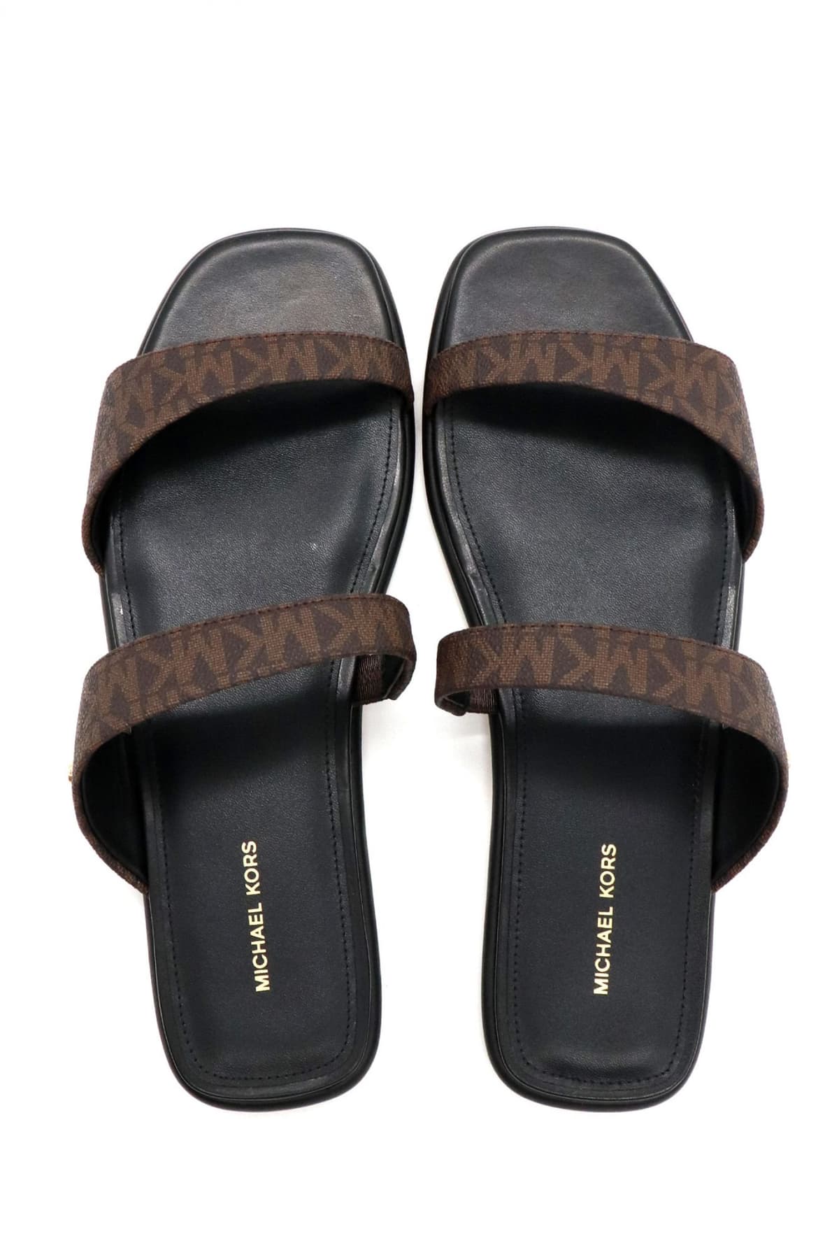 MICHAEL KORS ΠΑΠΟΥΤΣΙΑ ΠΑΝΤΟΦΛΕΣ JAIDA FLAT SANDAL ALL OVER LOGO KΑΦΕ/ΜΑΥΡΟ