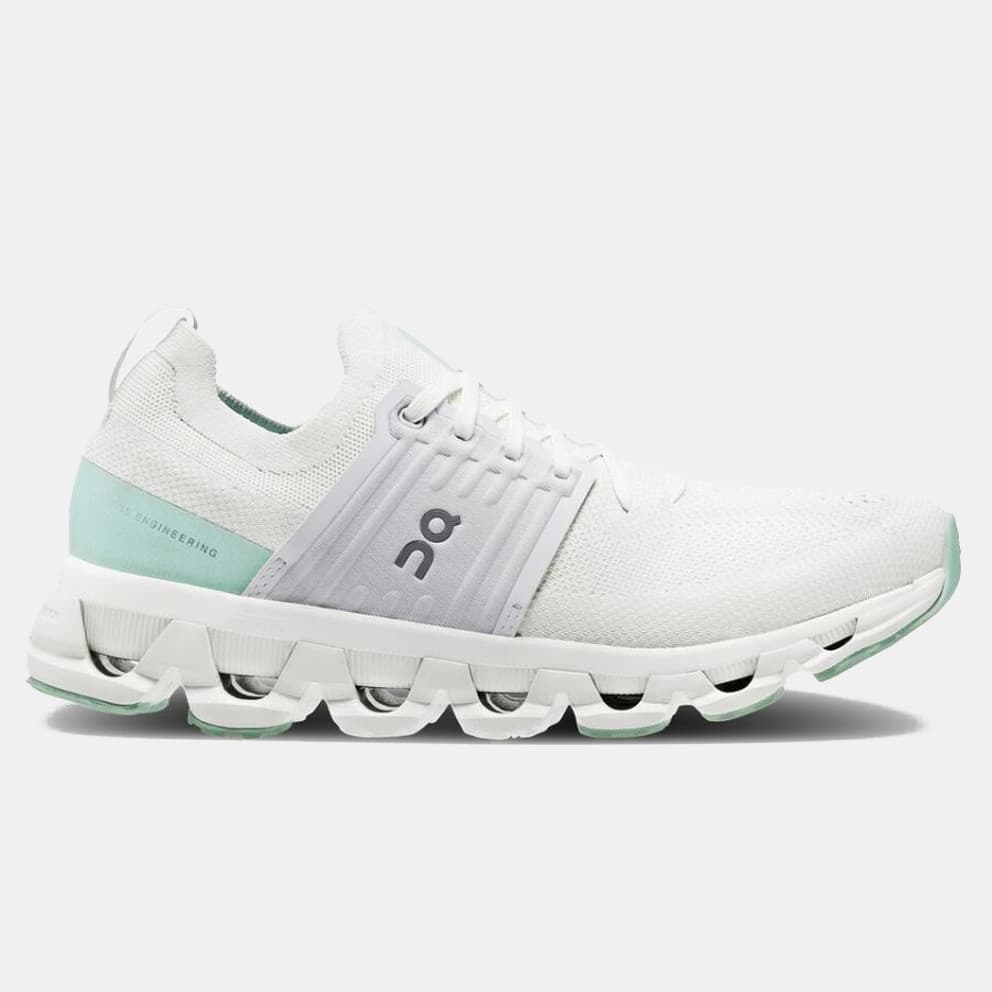 Women's Running Shoes On Gray