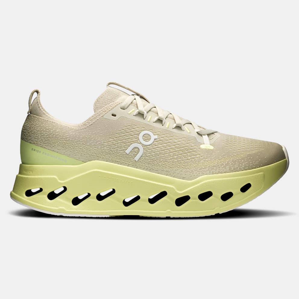 Men's Running Shoes On Green